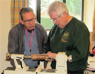 Chris Withall discussing setting up a small log with new member Alan Kite